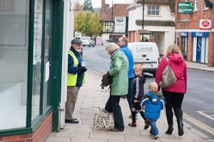 Rotarian Mike prince collecting at the entrance to Weavers Court